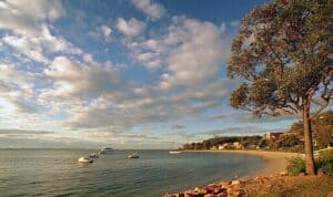 Port Stephens beach with boats in the water