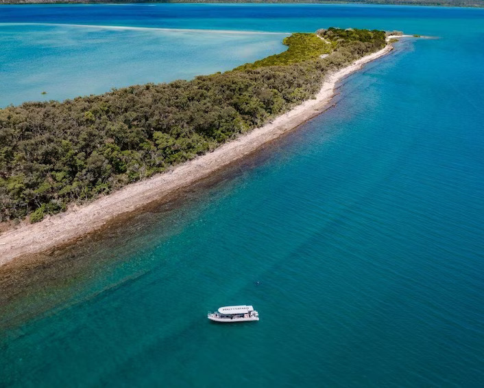 Boat approaching beach of Island near Hervey Bay