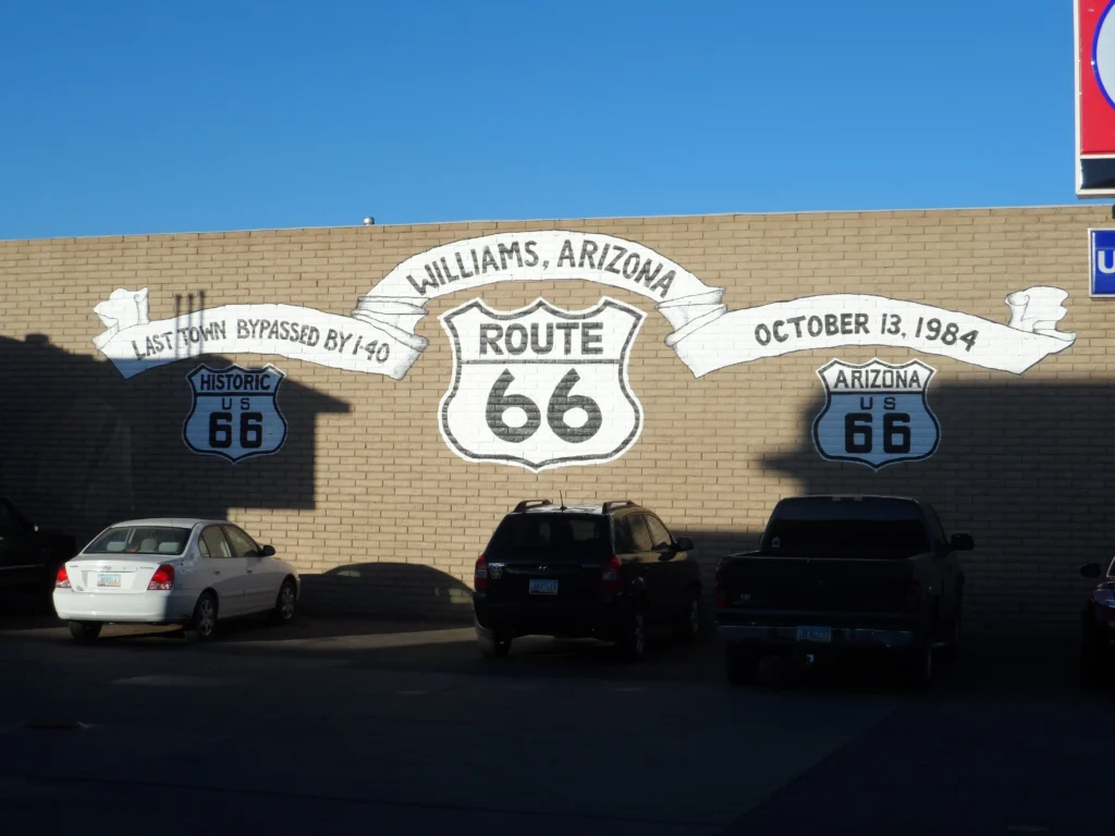 Route 66 sign on side of building in Williams AZ