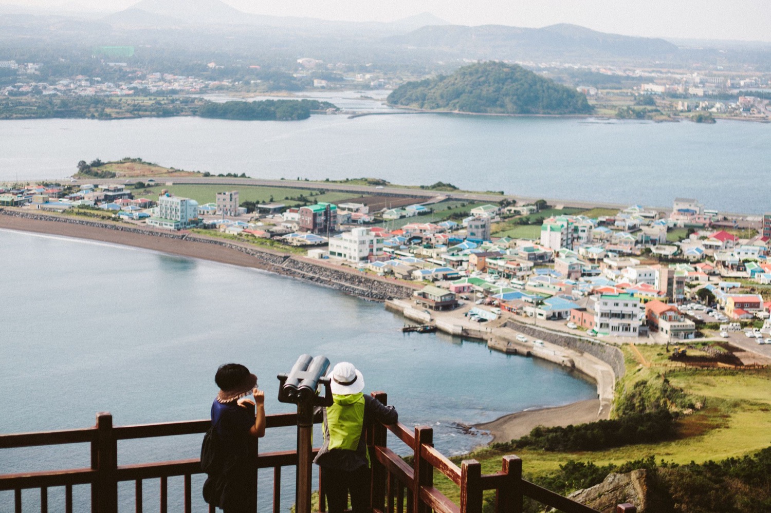 View over Seongsan-ri town and coastline from Seongsan Ilchulbong, Jeju Island
