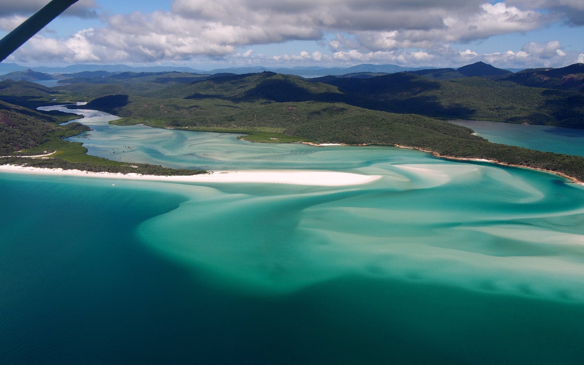 Aerial view of the turquoise sandbar swirl at Hill Inlet, Whitehaven Beach, in the Whitsundays, Queensland