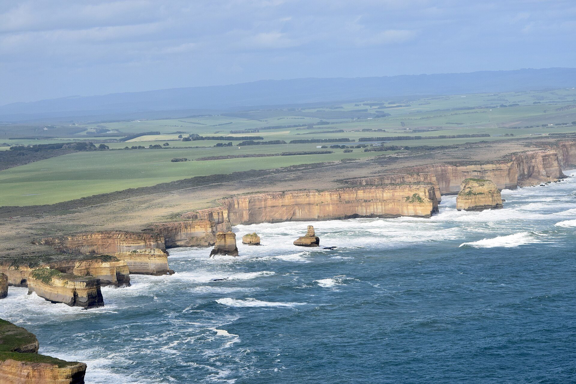 The Twelve Apostles limestone stacks at sunset along the Great Ocean Road, Victoria