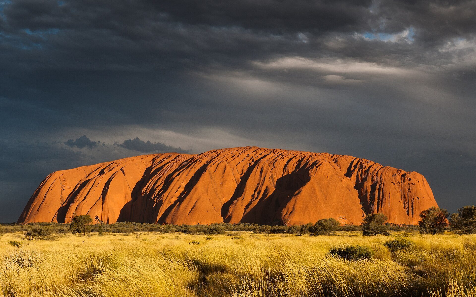 Uluru (Ayers Rock) glowing red at sunset in the Red Centre, Northern Territory